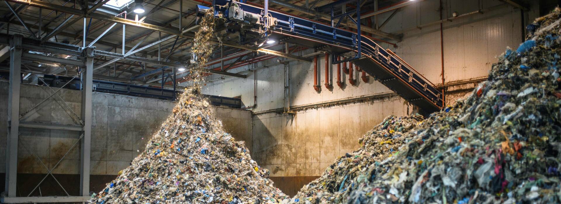 machine creating piles of recycling